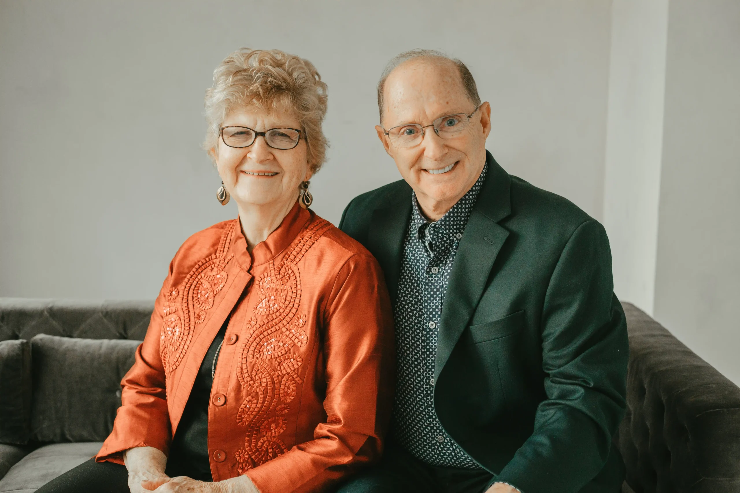 Marvin and Leah Yoder seated in a counch